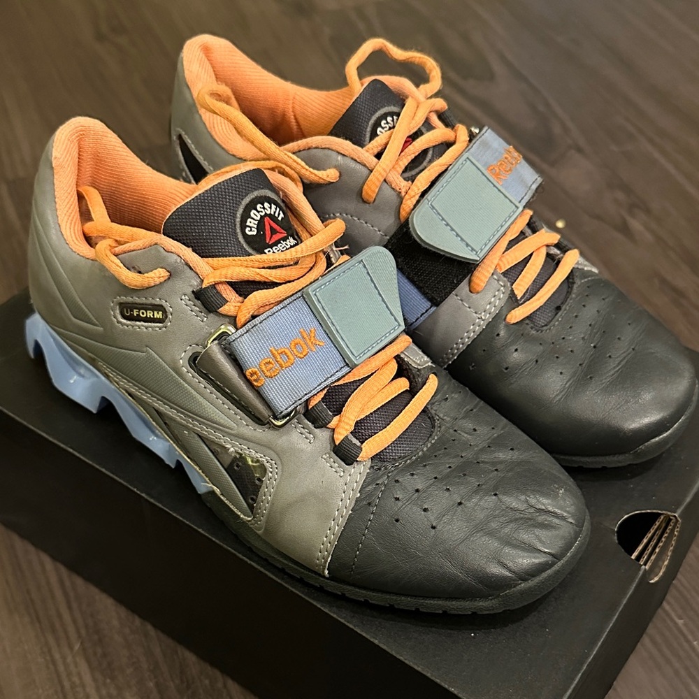 Reebok Black and Gray Sneakers with Orange Accents